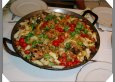 Paella mit Kaninchen und Spargel