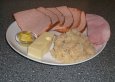 Rezept Leberkäse mit Sauerkrautfüllung, überbacken (Leberkäseröllchen)